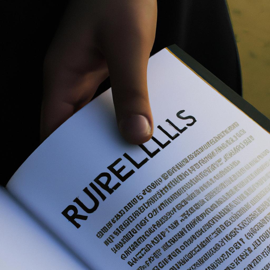 Person holding a rulebook